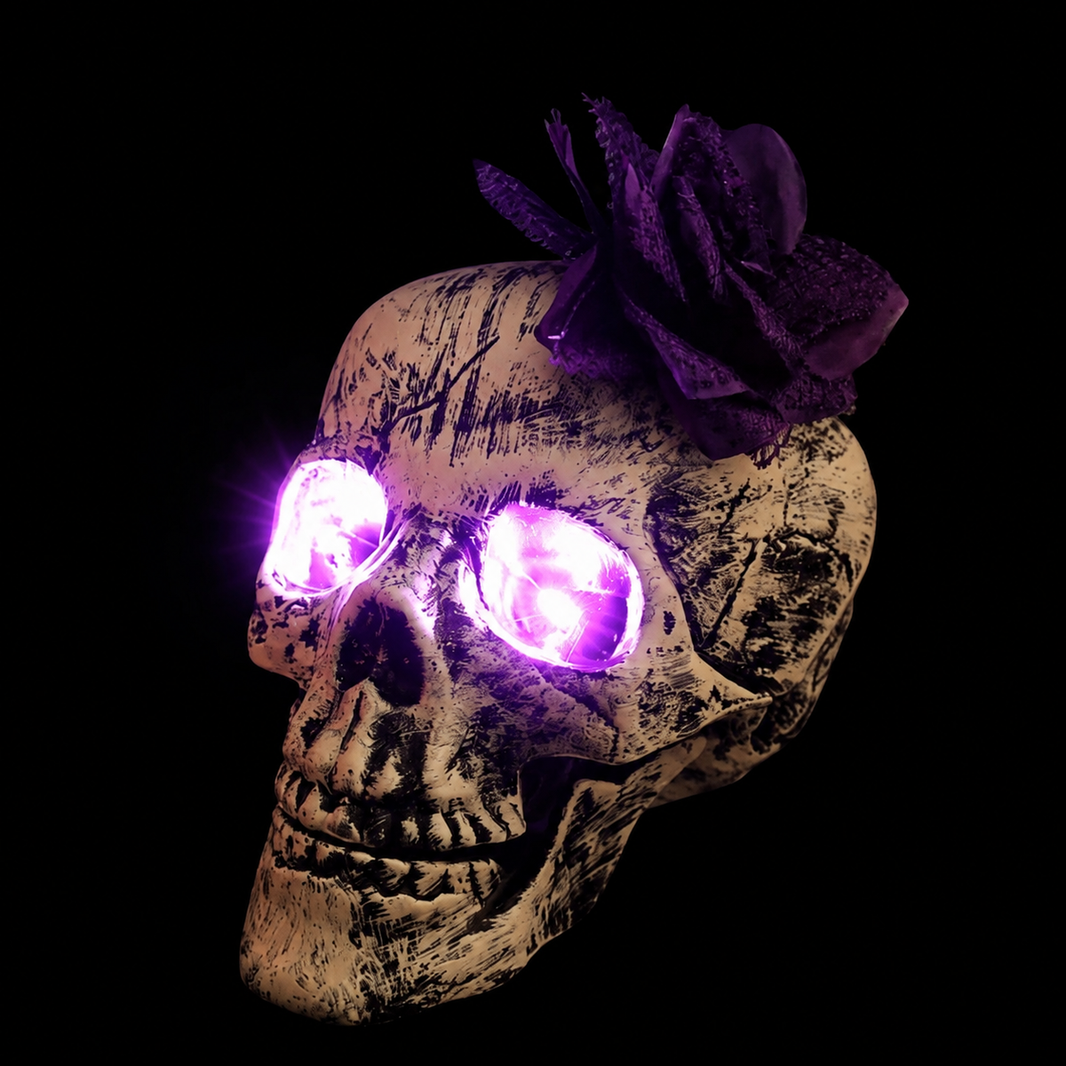 LED-Totenkopf mit Blume als Halloween-Deko